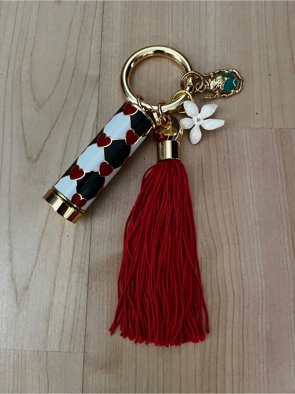 Carolina Herrera Keychain with
Lipstick, Tassel, and Other Accessories